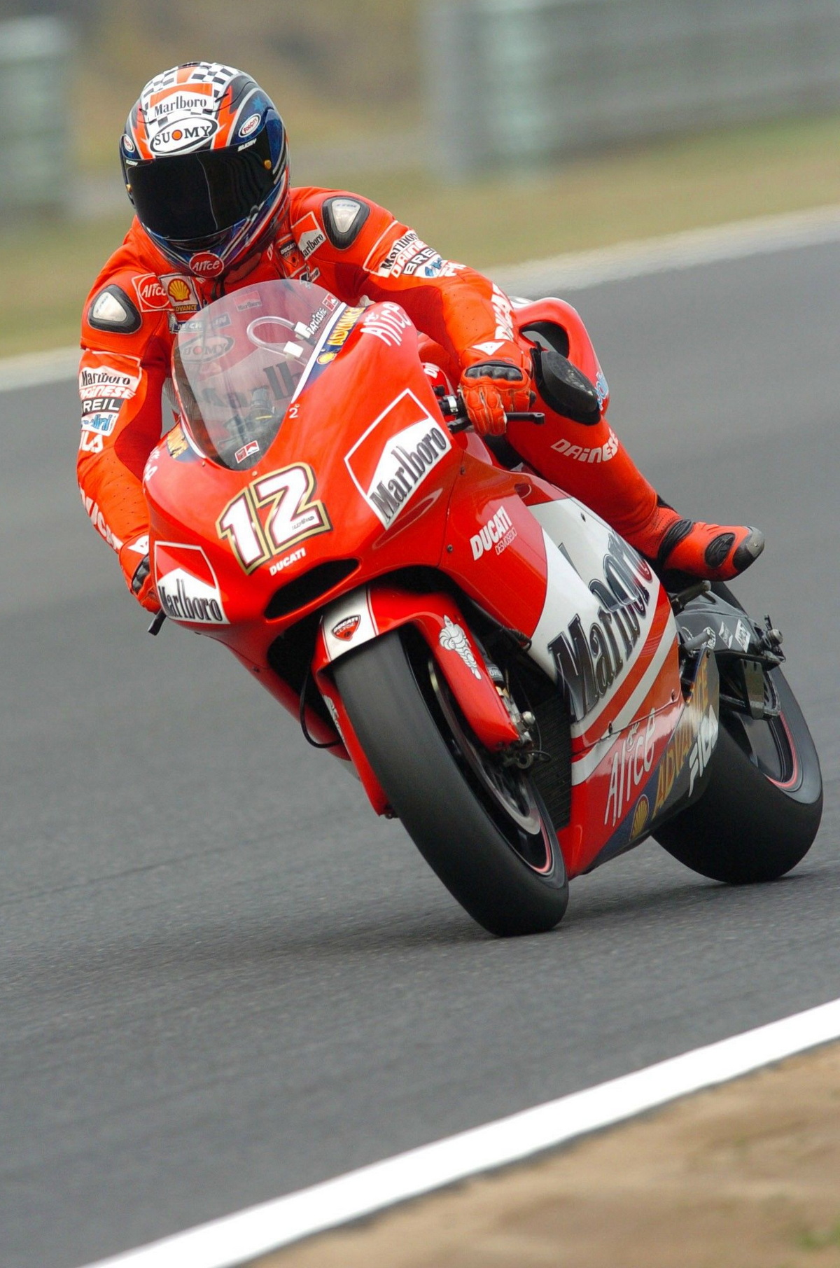 Трой Бейлисс на борту Ducati Desmosedici GP4 (2004)