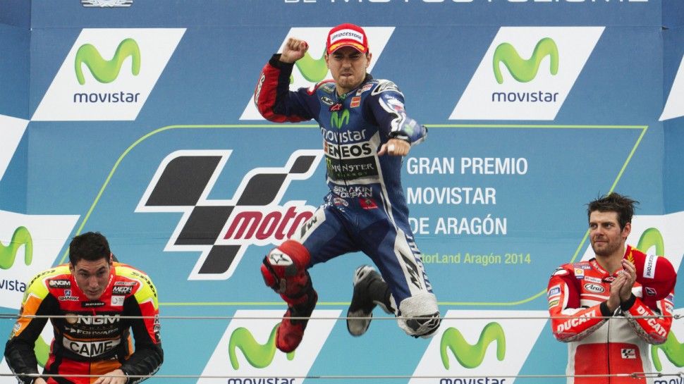 Хорхе Лоренцо, победитель Гран-При Арагона 2014 года. Алеш Эспаргаро и Кэл Кратчлоу на подиуме